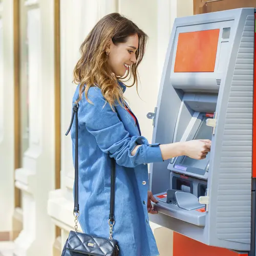 Image showing female using ATM